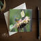 A special occasion greeting card and envelope with a colorful bird on a sunflower available at Cove Creek Photography.